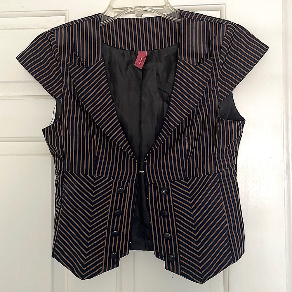 Thrifted vest!! Super cute and can fit sized small through medium!!